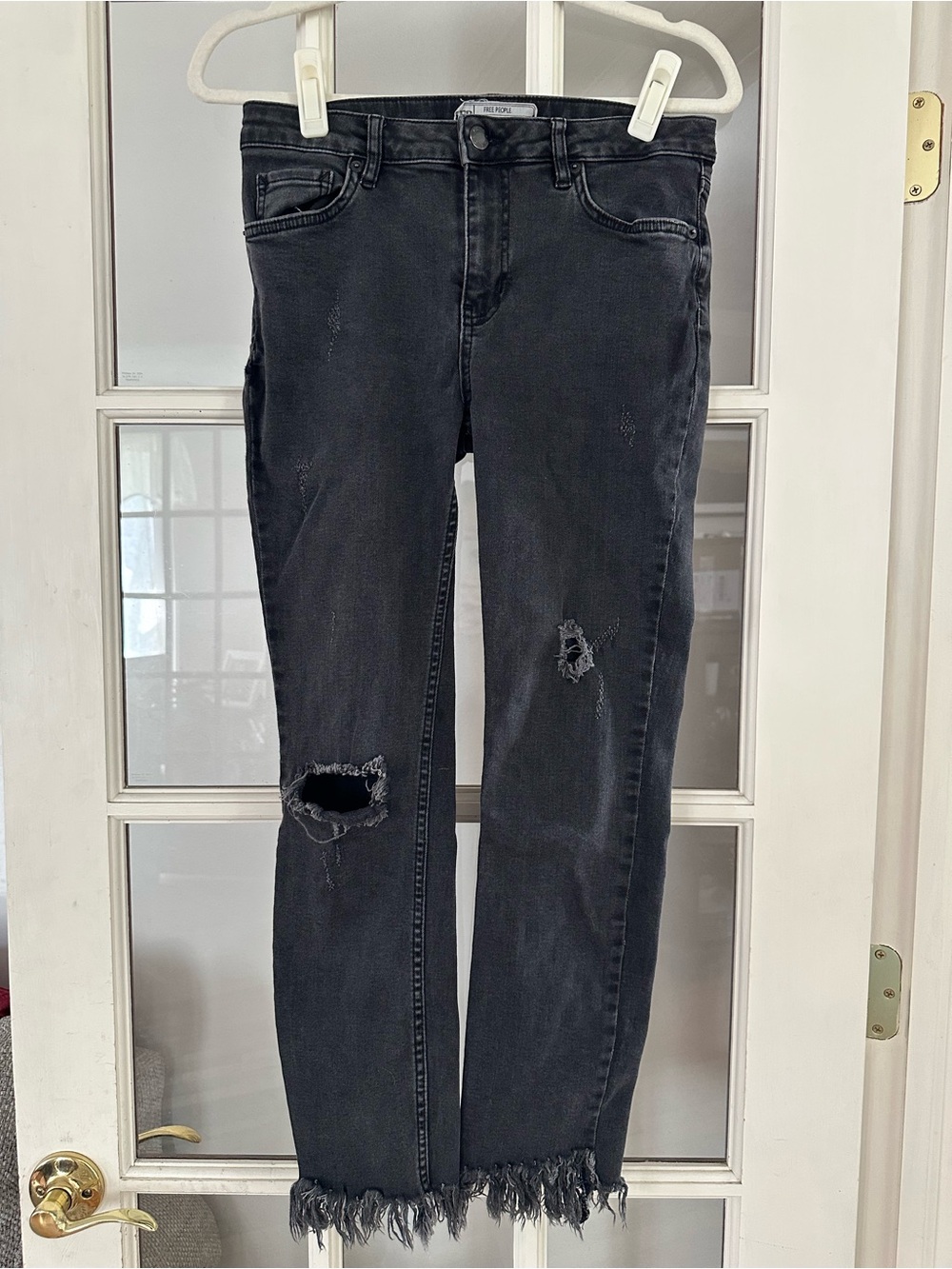 Free People Distressed Black Fringe Hem Skinny Jeans
